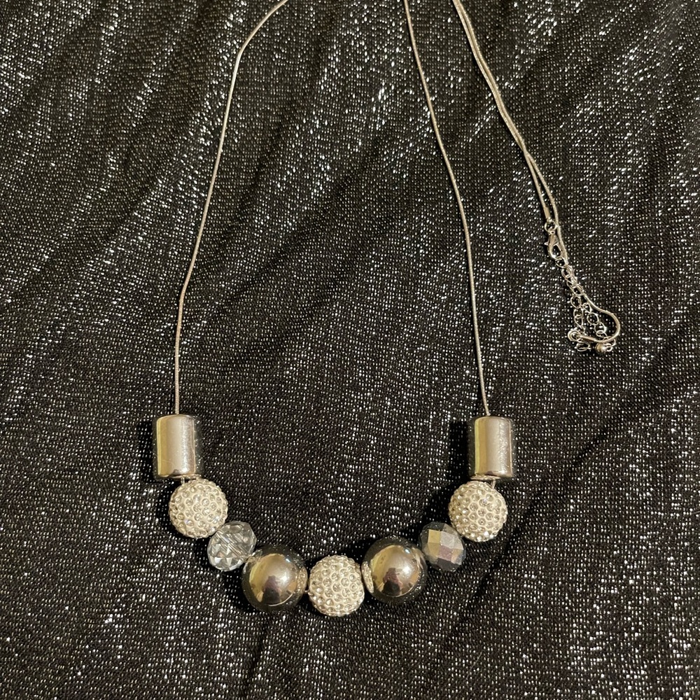 Fun, funky, silver-tone, sparkly, long necklace.